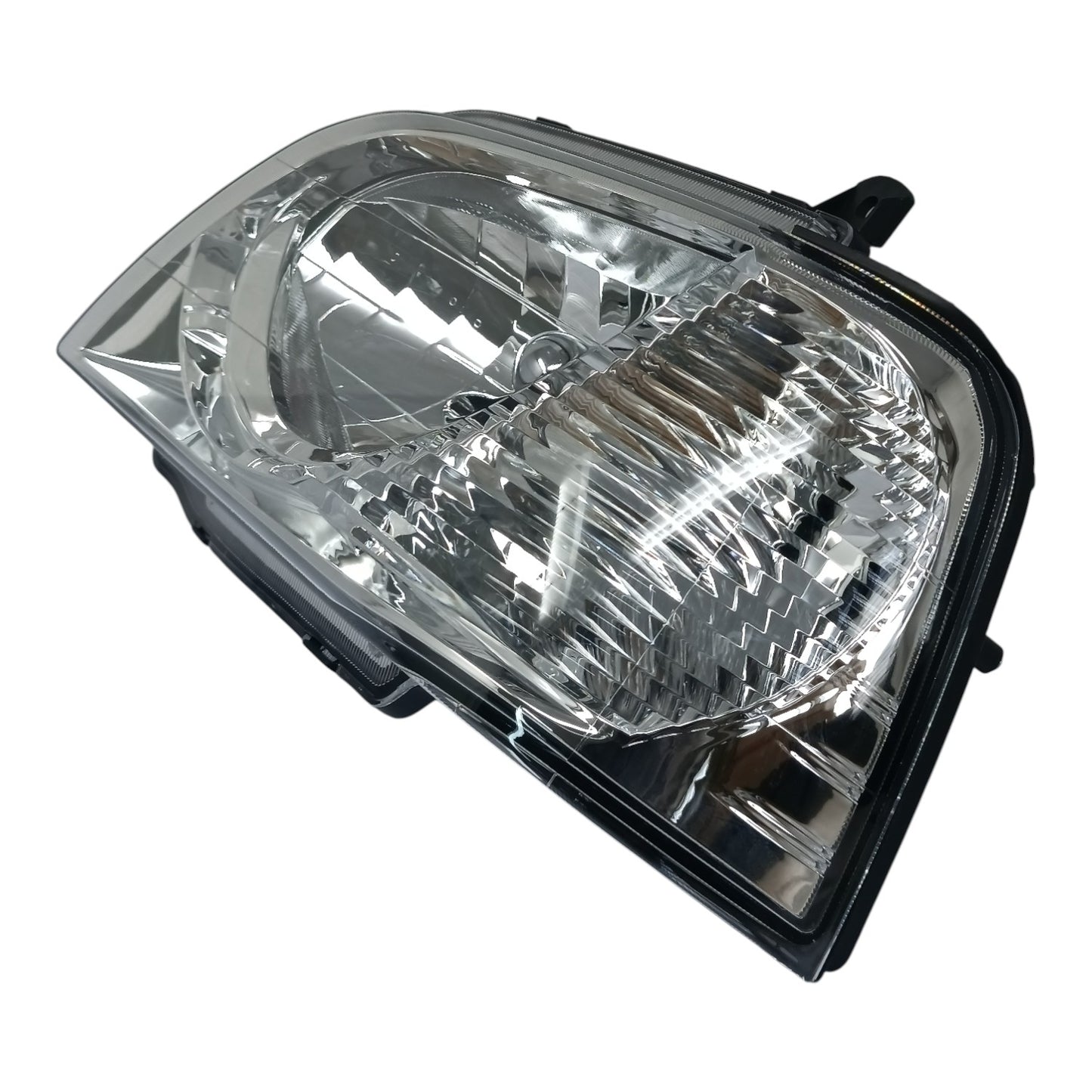 VISTA LATERAL DE FARO DELANTERRO IZQUIERDO SUZUKI EECO 2015 2023 OEM